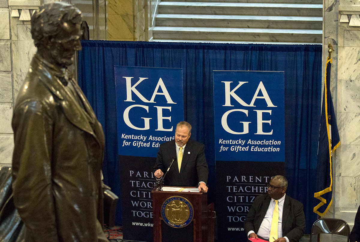 Sen. Mike Wilson of Bowling Green, the chairman of the Senate Education Committee, speaks during the ceremony.
