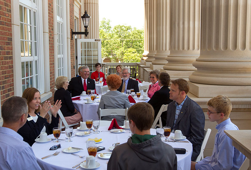 Dignitaries and special guests attend a luncheon at Ransdell Hall before the ceremony.