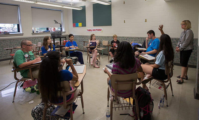 Bonnie Honaker leads her class in a discussion of different ways to bring inspiration into their writing during Be A Writer Monday, June 8. (Photo by Emilie Milcarek)