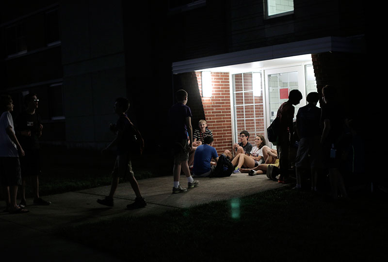 VAMPY campers relax behind Northeast Hall during community time Wednesday, June 24. During community time, campers can relax and hang out with their friends. (Photo by Emilie Milcarek)