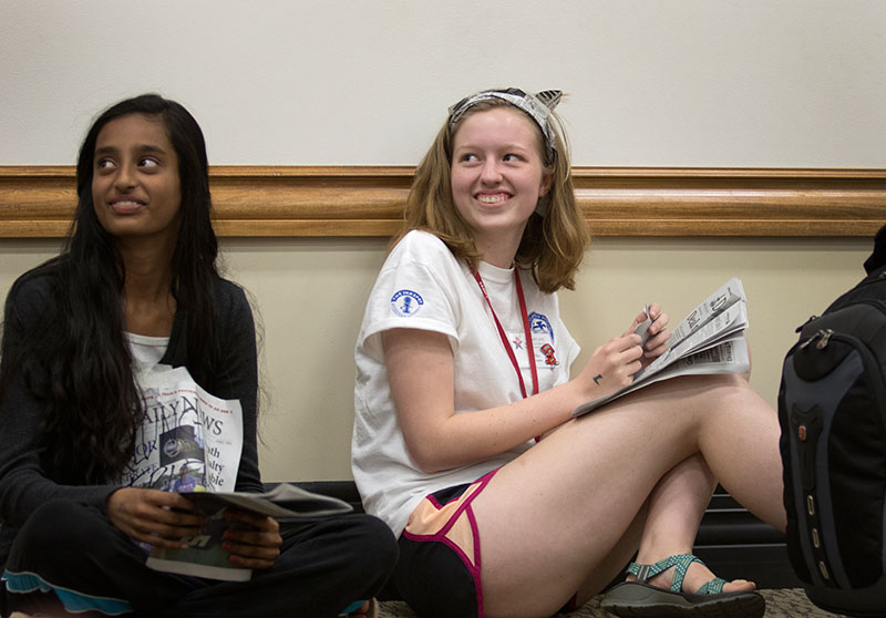 Bhavana Pavuluri (left) of Louisville and Ella Franklin of Lexington laugh at their cast mates during their groups' performance at Paper Theatre Saturday, June 27.  (Photo by Emilie Milcarek)