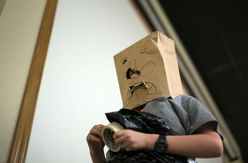 Will Muse of Somerset wears a paper bag costume during SCATS Paper Theatre Saturday, June 13.  (Photo by Emilie Milcarek)