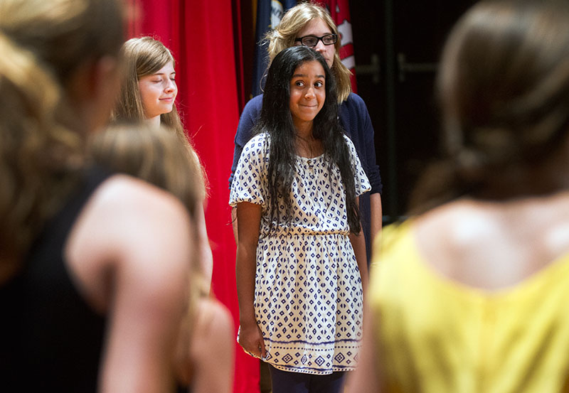 Shruit Gautam of Bowling Green wait for the right moment to start singing during the Musical Troupe performance after the SCATS Banquet Thursday, June 18. (Photo by Sam Oldenburg)
