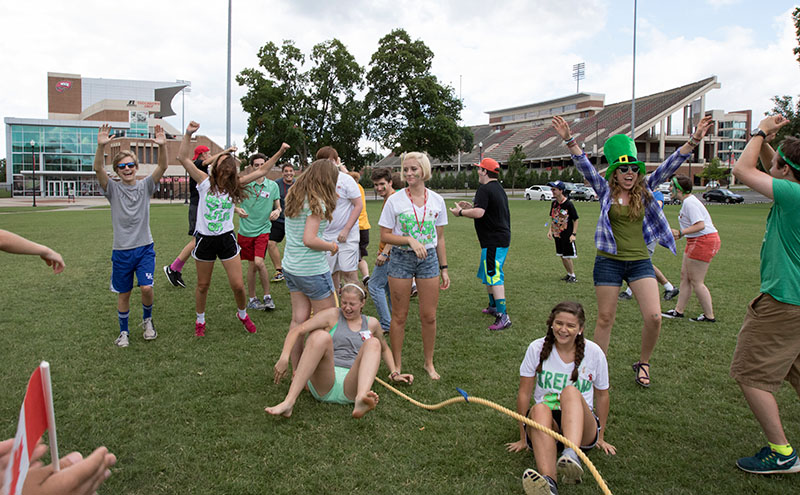 Team Ireland celebrates after winning tug-of-war in the annual VAMPY Olympics on Saturday, June 27.  (Photo by Emilie Milcarek)