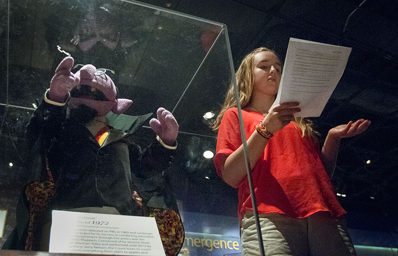 Madison Fleischaker of Louisville gives a report on Sesame Street's Count Von Count at the National Museum of American History in Washington, D.C., Tuesday, June 30. (Photo by Sam Oldenburg)