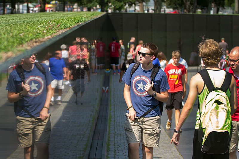 Simon Heimbrock of Louisville looks at the Vietnam Veterans Memorial in Washington, D.C., during a Pop Culture field trip Tuesday, June 30. (Photo by Sam Oldenburg)