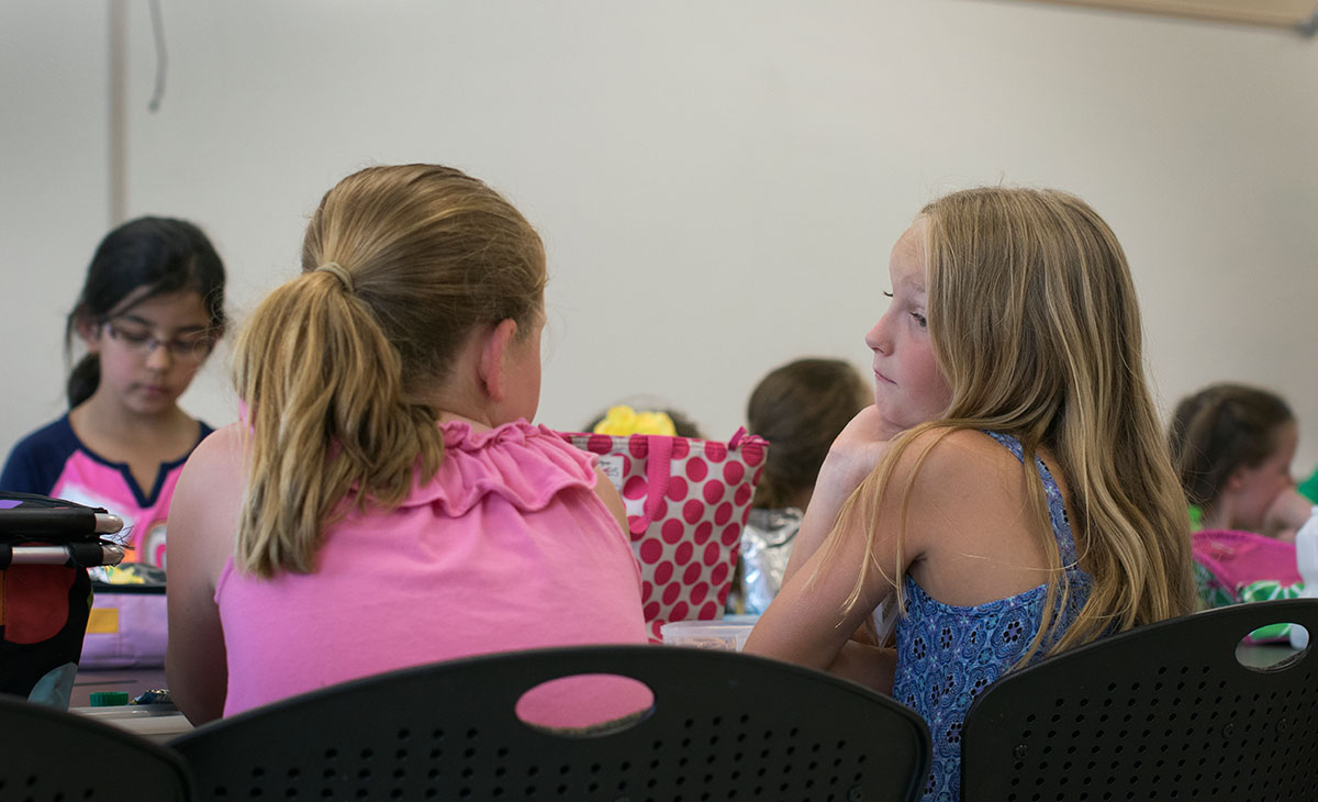 Explore campers visit during lunch Monday, July 6. (Photo by Emilie Milcarek)