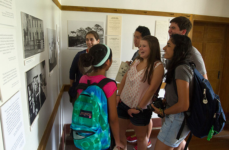 Writing students tour the South Union Shaker Village in Auburn Friday, July 3. (Photo by Sam Oldenburg)