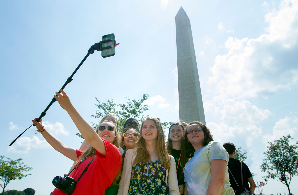 VAMPY Pop Culture students take a selfie in front of the Washington Monument during a field trip to Washington D.C. Tuesday, June 30. (Photo by Sam Oldenburg)