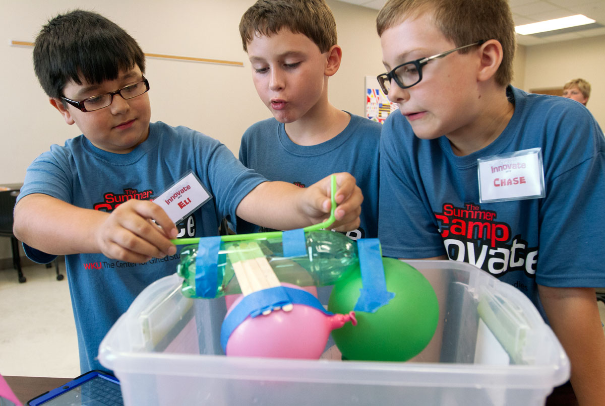 Camp Innovate students test their boat in Math Friday, July 3. (Photo by Sam Oldenburg)