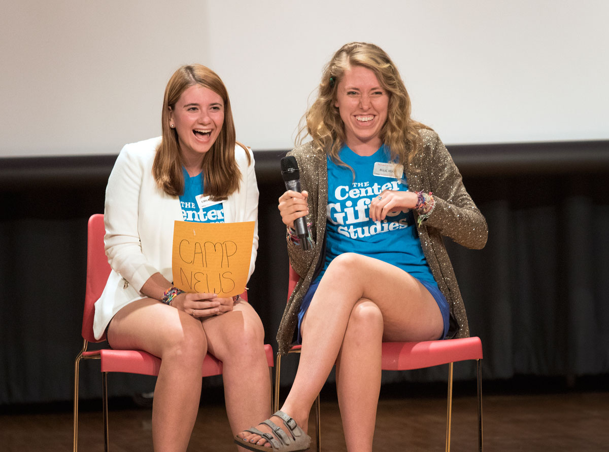 Counselors Emily Powell (left) and Ellie Hogg can't keep a straight face during their skit, "Counselor Update", a VAMPY tradition, where the counselors poke fun at the campers during the VAMPY Talent Show Thursday, July 9. (Photo by Emilie Milcarek)
