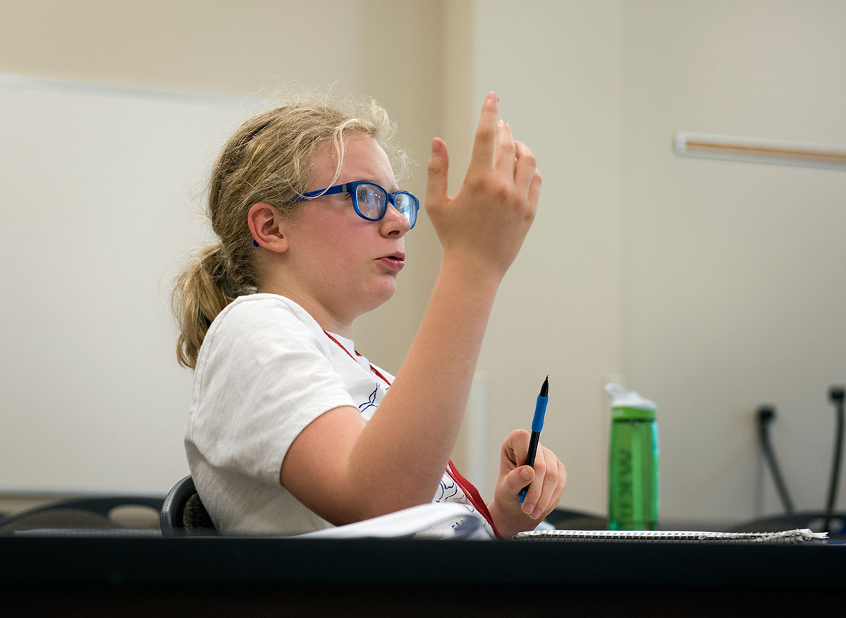 Abby Adams-Smith of Bowling Green works to explain the irony in the musical "Wicked" during the similarly named Wicked Irony class Thursday, June 16. (Photo by Tucker Allen Covey)