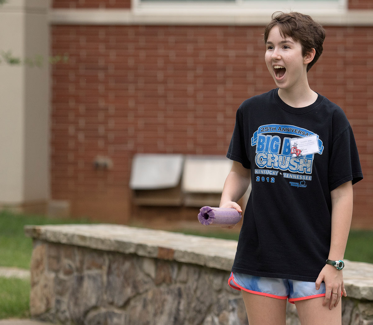 Zoe Ward of Frankfort reacts to a move made by another camper during the humans versus zombies optional Monday, June 27.  (Photo by Sam Oldenburg)}