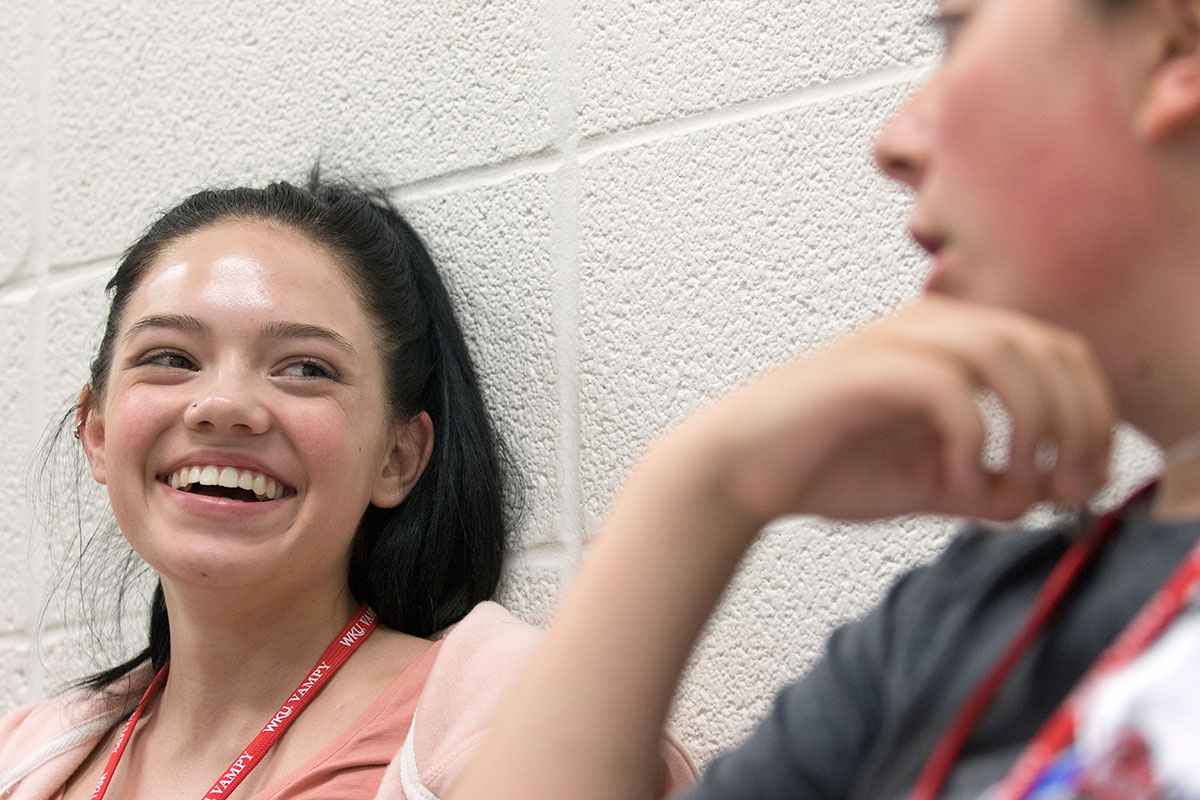 Emily Johnson of Louisville laughs with a Presidential Politics classmate during study hall Monday, June 27. On nights when there will be class the following day, campers have a one-hour study hall led by their teaching assistant to supplement what they learned during the day. (Photo by Sam Oldenburg)