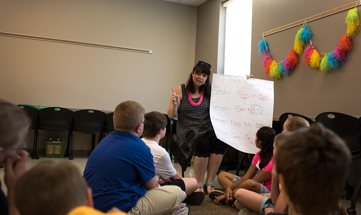 On the first day of Camp Innovate, Math teacher Allison Bemiss goes over the week;s schedule with campers Monday, June 6. (Photo by Tucker Covey)