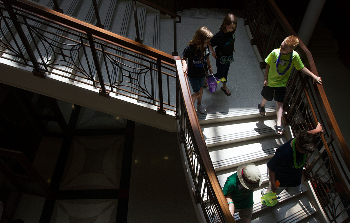 Camp Innovate students walk through Gary Ransdell Hall on their way outside for a Math activity during Camp Innovate. (Photo by Sam Oldenburg)