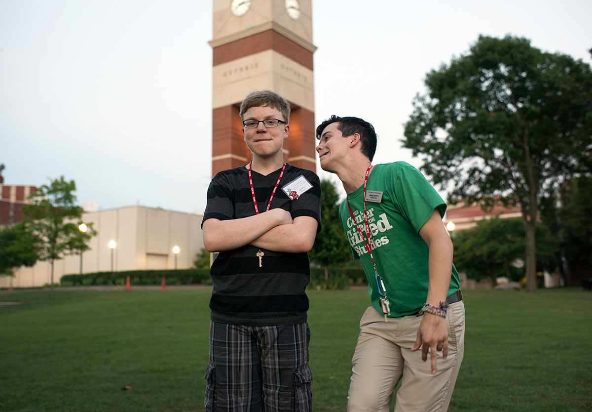 Griffin Salsman from Springfield, Tennessee, tries to stay composed as counselor Jake Petty attempts to make him laugh during a game of Pterodactyl Sunday, June 12, on South Lawn. (Photo by Tucker Allen Covey)