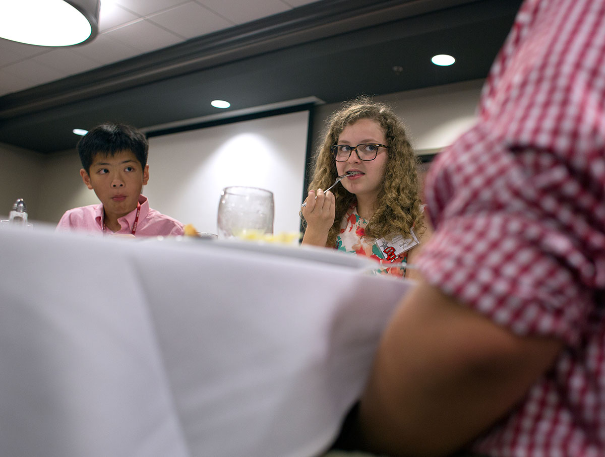 Emma Fridy from Louisville enjoys time with friends during the SCATS banquet Thursday, June 23. (Photo by Tucker Allen Covey)