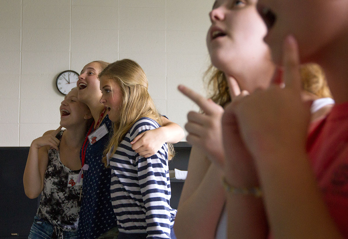Evie Ellis (from left) of Russellville, Mary Baker of Paducah, and Anna Maddux of Pembroke rehearse a song during Singing 101 Tuesday, June 21. (Photo by Sam Oldenburg)