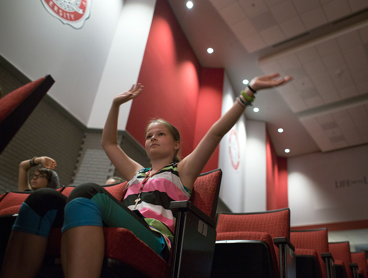 Audrey Thacker from Louisville waves her hands to the music during a performance of "Break Even" by Kathleen Alcock at the SCATS Talent Show on Wednesday, June 22. (Photo by Tucker Allen Covey)