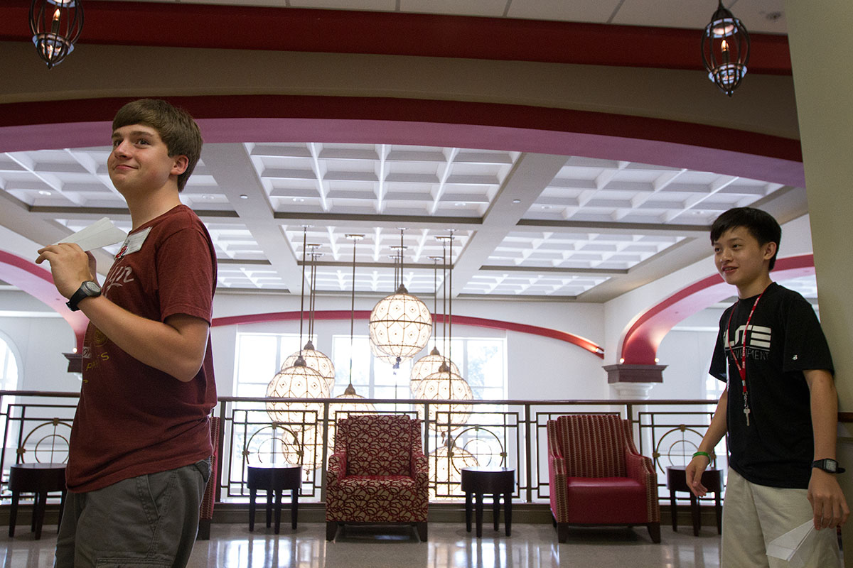 Jackson Hayes (left) of Shelbyville and Trevor Zou of Nashville, Tennessee, test their paper airplanes during Creative Problem Solving Monday, June 13, in the Honors College and International Center. (Photo by Sam Oldenburg)