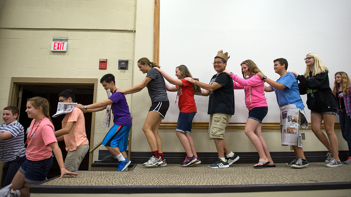 A conga line breaks out as campers exit stage after performing their randomly chosen plays during Paper Theatre Saturday, June 18. (Photo by Tucker Allen Covey)