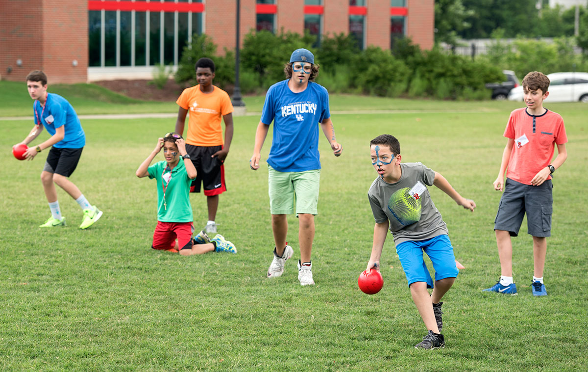 Samuel Thompson of Lebanon, Kentucky, charges ahead of his teammates on Team Atlantis during dodgeball at SCATS Olympics Saturday, June 18. (Photo by Tucker Allen Covey)