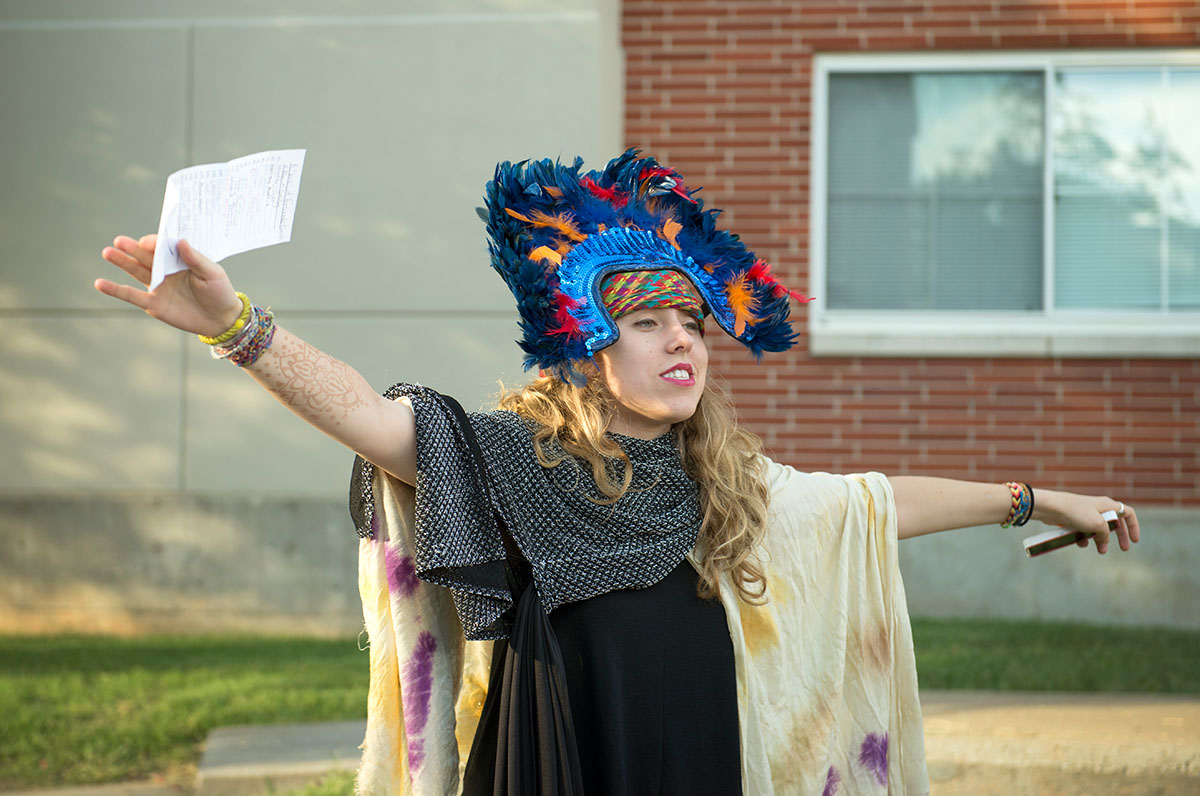 Counselor Ellie Hogg beckons campers while dressed up for her optional, Series of Fortunate Events, on Tuesday, June 29. (Photo by Tucker Allen Covey)