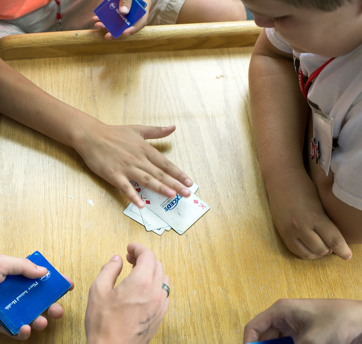 Campers play the card game Slaps in Northeast Hall Sunday, July 3. (Photos by Tucker Allen Covey)