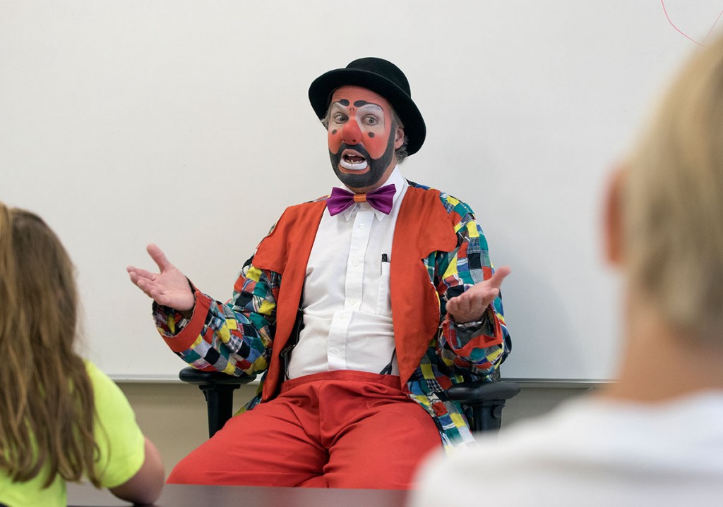 Clowning instructor Nick Wilkins, aka Broadway the Clown, talks to students about his the education that led to his career as a clown. (Photo by Sam Oldenburg)