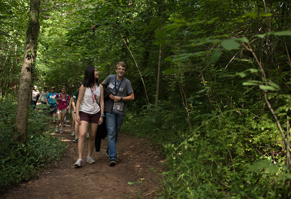 Writing students walk the trails surrounding Lost River Cave in Bowling Green Thursday, July 14. (Photo by Tucker Allen Covey)