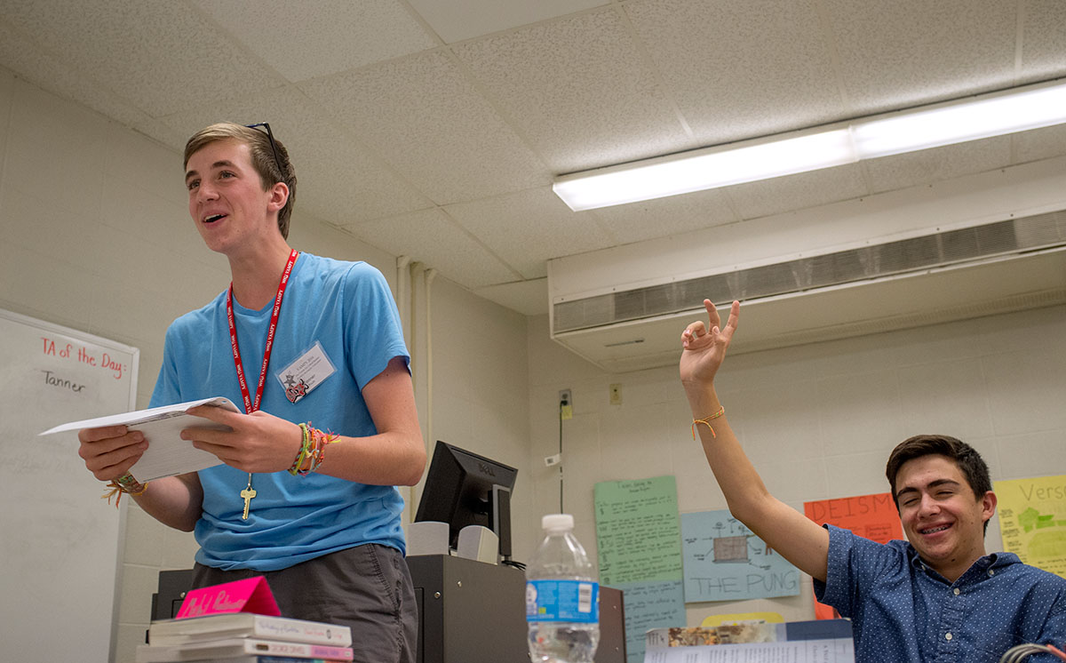 Tanner Pruitt (left) from Louisville plays the part of a figure from the Russian Revolution in a group discussion in Revolutions Thursday, July 14. (Photo by Tucker Allen Covey)