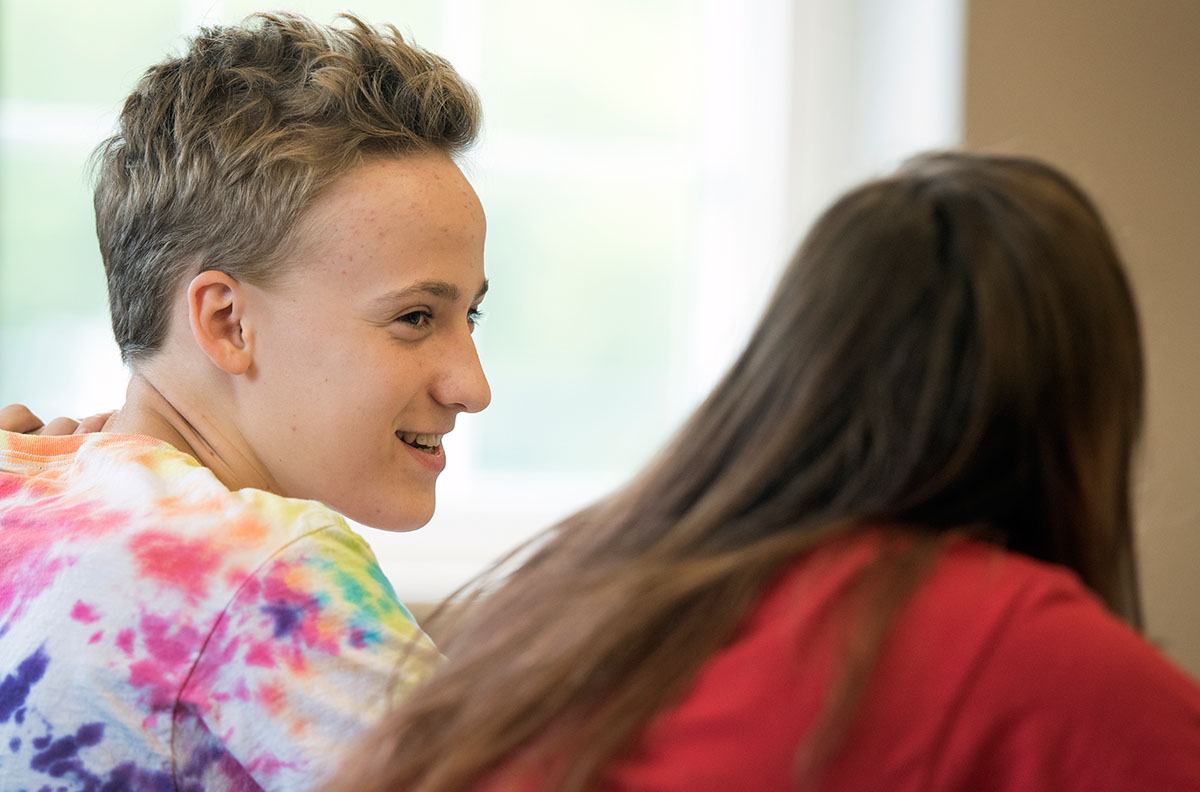 Parker Woods (left) from Brentwood, Tenn., jokes with a classmate before a guest speaker arrived to talk to the pop culture class Monday, July 11. (Photo by Tucker Allen Covey)