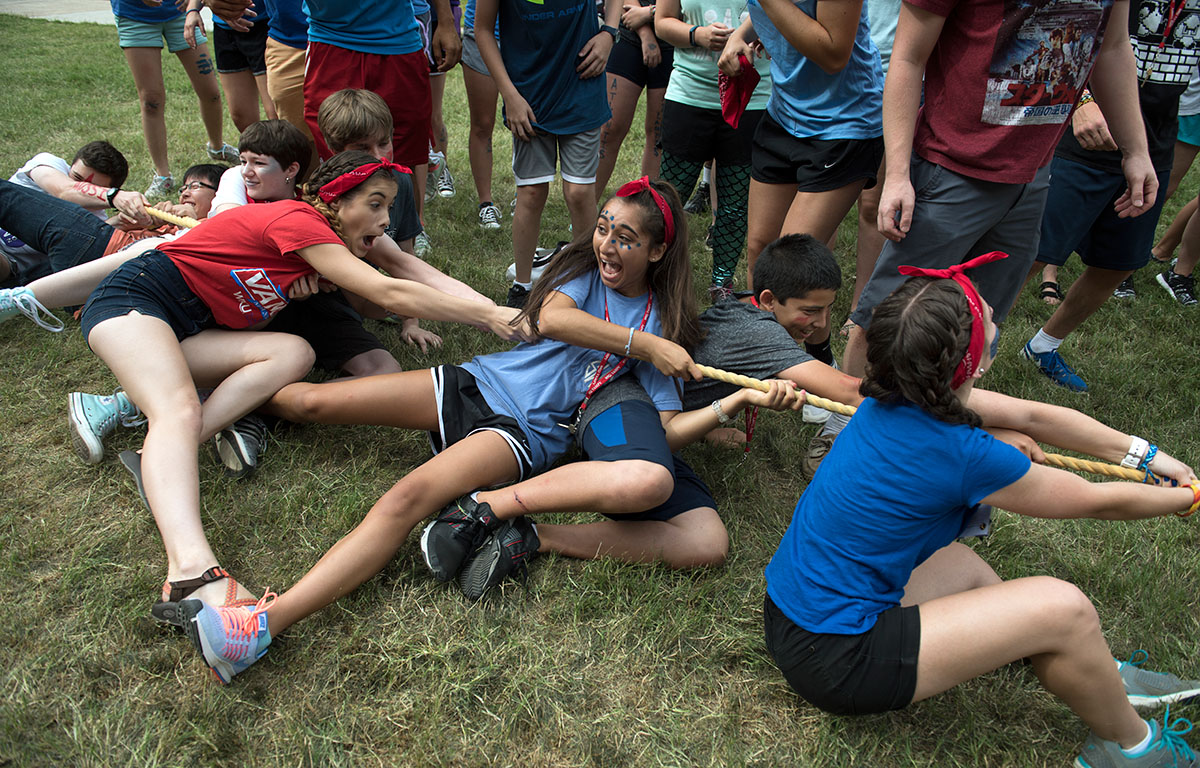 Team Australia tumbles to the ground during tug-of-war in the VAMPY Olympics Saturday, July 2. (Photo by Tucker Allen Covey)