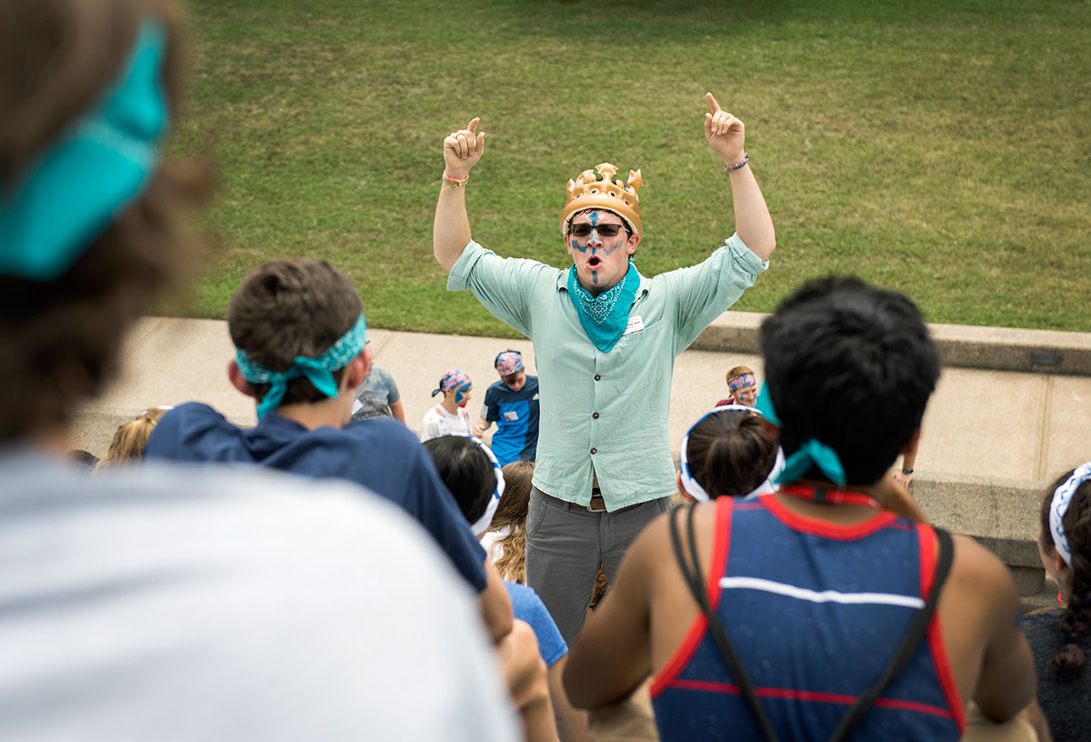 Counselor Andrew Brown leads Team Atlantis in a chant before the opening ceremonies of the VAMPY Olympics Saturday, July 2, at the Colonnades. (Photo by Tucker Allen Covey)