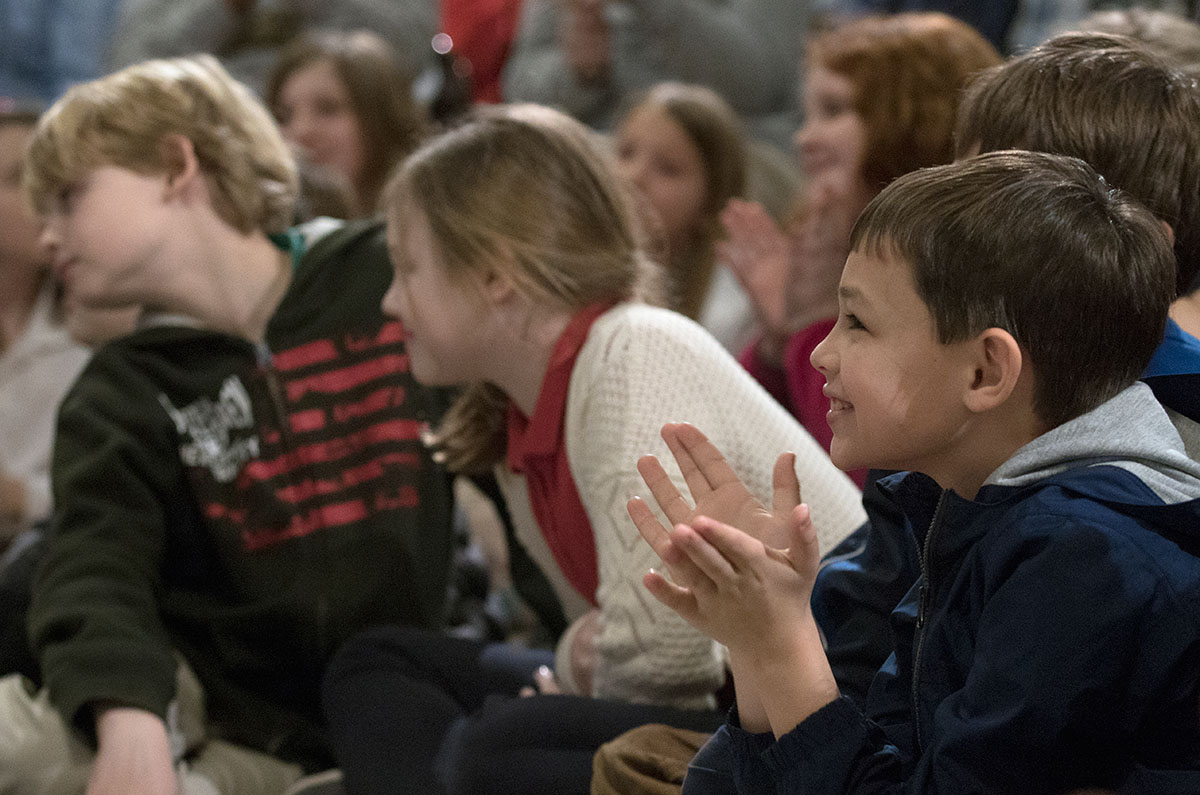 Student from the Ashland Independent School District applaud a speaker during the ceremony celebrating Gifted Education Month in Kentucky. (Photo by Sam Oldenburg)
