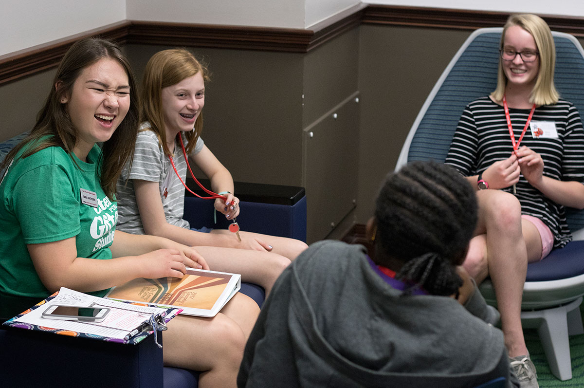 Counselor Sara Rastoder (from left), Lindsay Whitaker of Lexington, and Eliza Scoggin of Midway meet their hall mates during their first hall meeting Sunday, June 11. The meeting also gave counselors the opportunity to go over rules and expectations with the campers. (Photo by Brook Joyner)