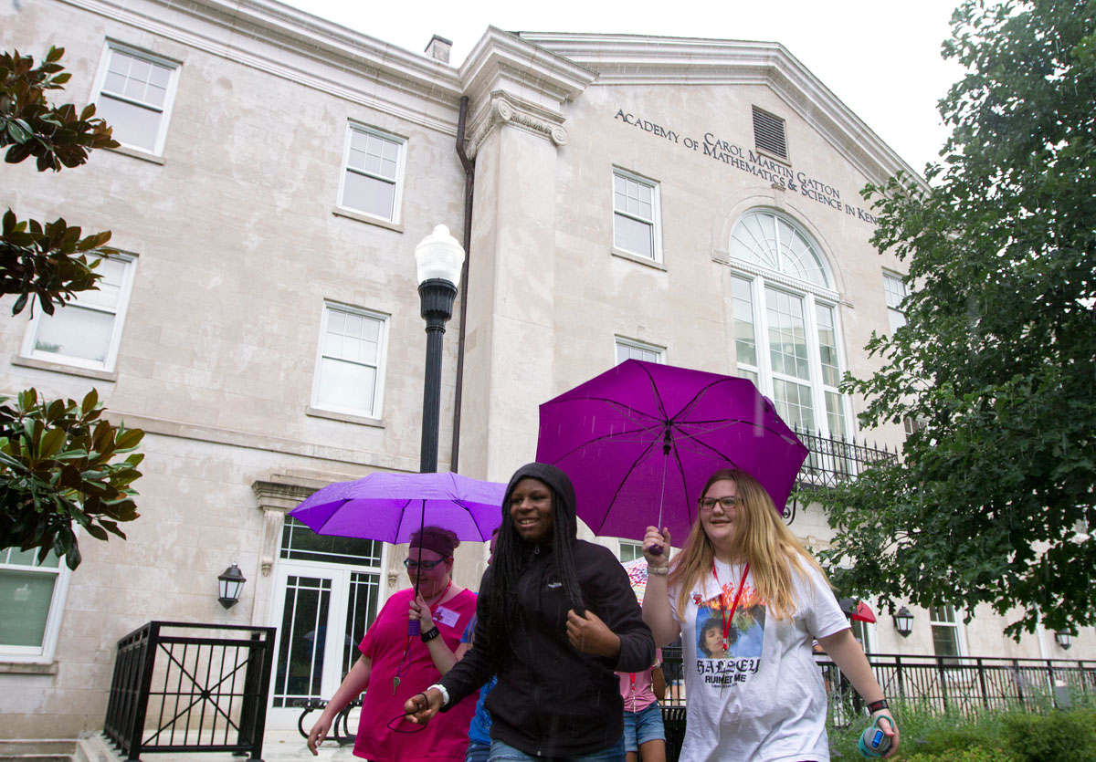 Jasmine Miles (left) of Union and Kandi Rogers of Owensboro make their way out of Florence Schneider Hall to go to dinner Tuesday, June 13. (Photo by Sam Oldenburg)