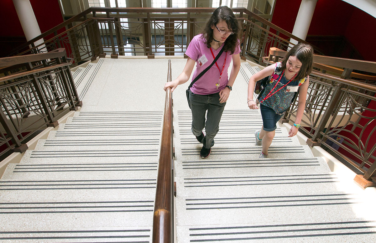 Veronica Walker (left) of Elizabethtown and Neva Cline of Pearland, Texas, walk to class together in Gary Ransdell Hall between third and fourth period Friday, June 16. (Photo by Sam Oldenburg)