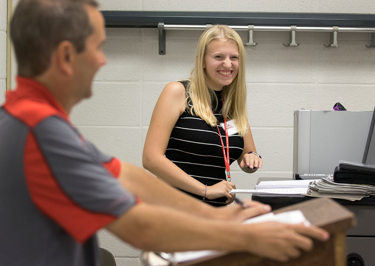 Evie Ellis of Russelleville debates with Presidential Politics teacher Dennis Jenkins in class Wednesday, June 28. Evie and Dennis took on the roles of George McGovern and Richard Nixon and held a mock debate to explore the 1972 presidential election. (Photo by Brook Joyner)