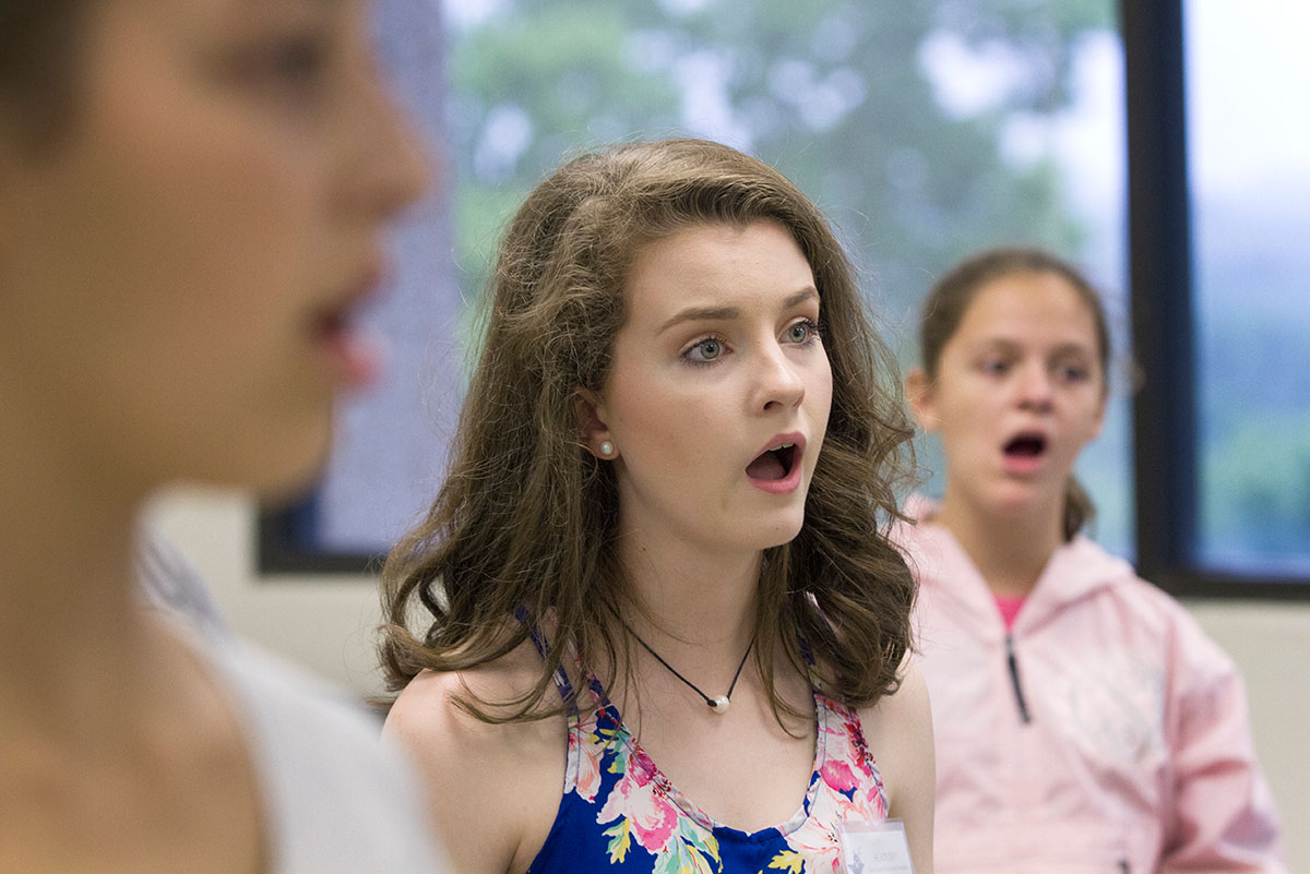 Emma North of Owensboro rehearses with classmates in Singing 101 Thursday, June 22. (Photo by Sam Oldenburg)