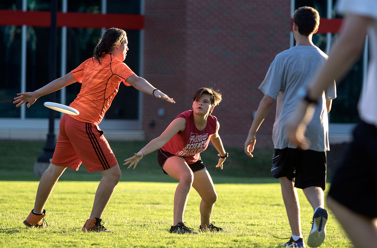 Laine Hirn of Louisville passes the frisbee during the ultimate optional Tuesday, June 27. (Photo by Brook Joyner)