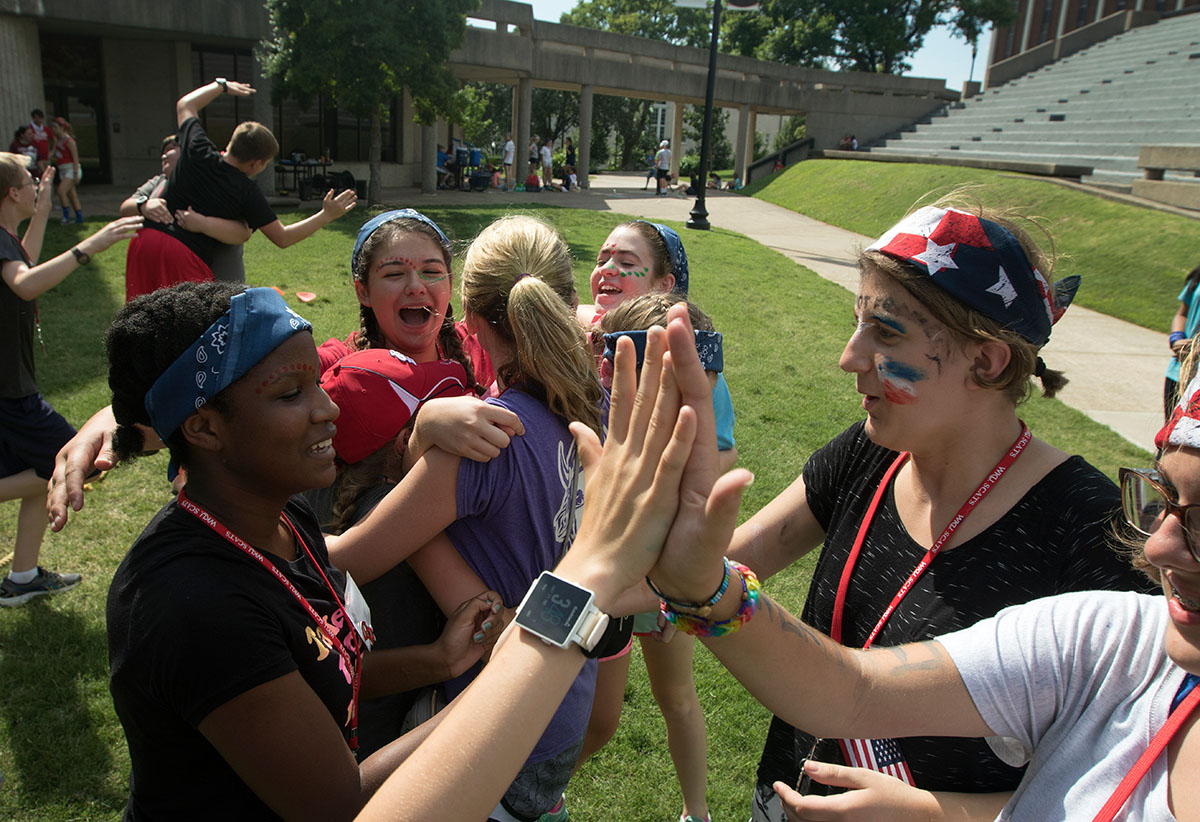 Team United States celebrates after wining a round of tug-of-war Saturday, June 17. Other events of the day included dodgeball and a relay race. (Photo by Brook Joyner)