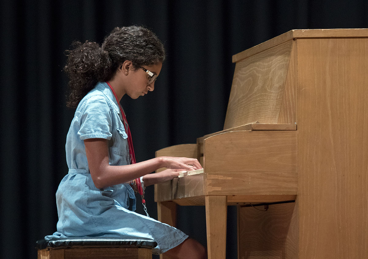 Maliki Smith of Frankfort performs "Breakaway" for the SCATS talent show Wednesday, June 21. (Photo by Brook Joyner)