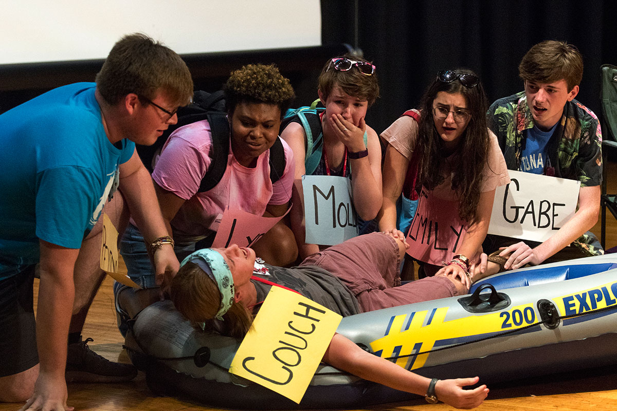 Sam Vitale (from left), Nate Turner, Ali Shackelford, Zoe Ward, Martha Popescu, and Jared Rogers perform a skit in-between acts during the VAMPY talent show Thursday, July 13. These campers were selected to be the emcees for this year's show. (Photo by Brook Joyner)