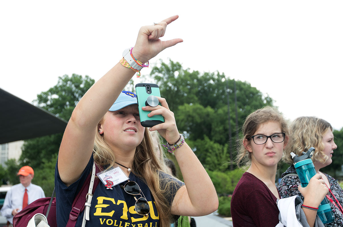 Maggie Kite of Jonesborough, Tenn. takes a picture of the Washington Monument during the Washington D.C. field trip Thursday, July 6. Students then went on a walking tour to see a variety of famous monuments. (Photo by Brook Joyner)