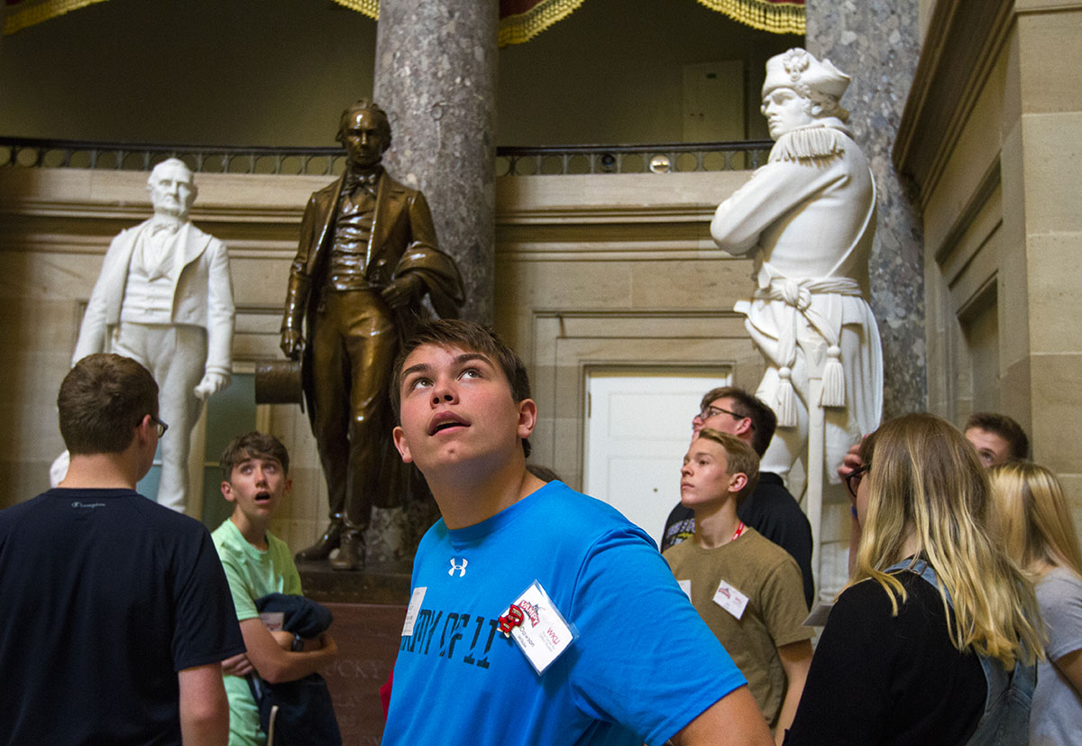 Dawson Wilcox of Greenville, Ala., looks around Statuary Hall in the United States Capitol during a tour with his Presidential Politics classmates on a field trop to Washington D.C. Thursday, July 6. (Photo by Sam Oldenburg)