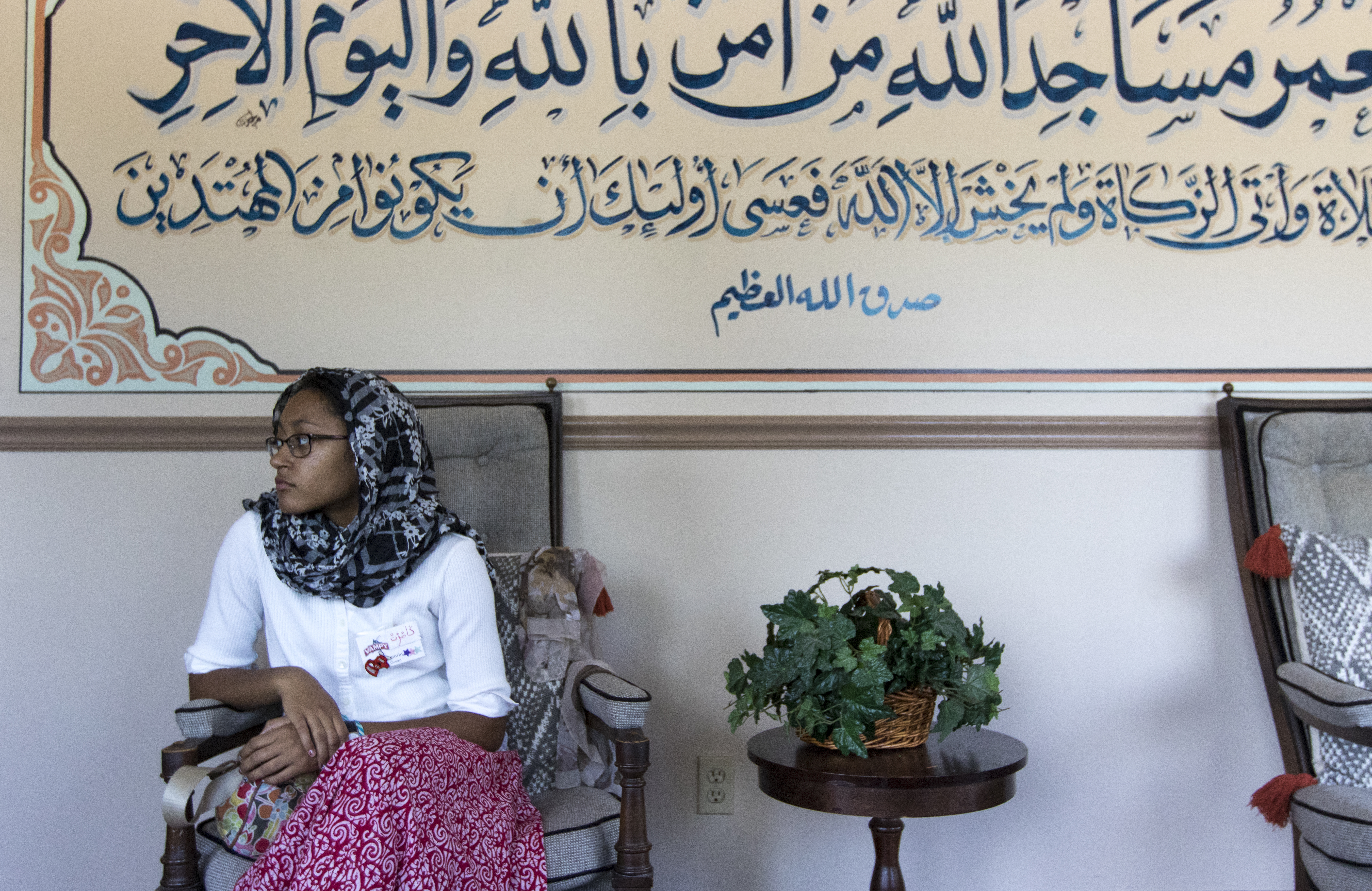 Kamrin Green of Bowling Green sits in the lobby of the Muslim American Cultural Center in Nashville Tuesday, July 11. Students had the opportunity to practice their Arabic as well as learn new words and phrases during their field trip. (Photo by Brook Joyner)