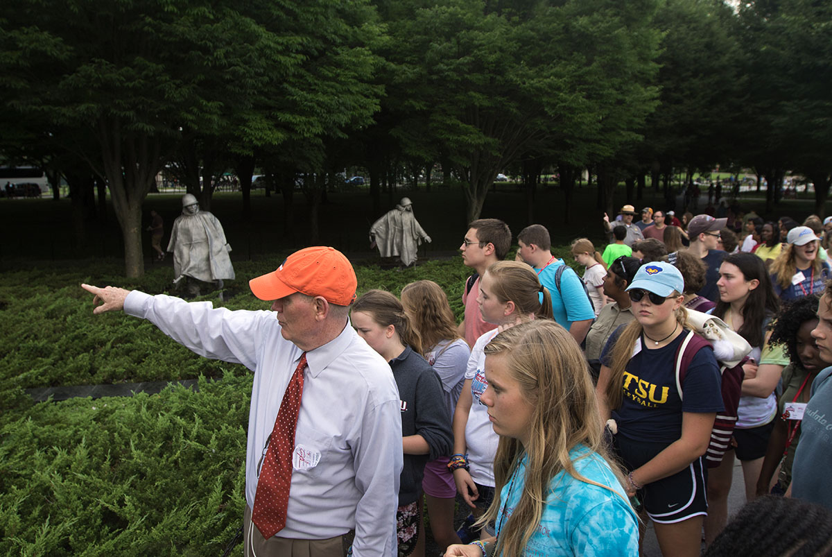 Nazi Germany and the Holocaust teacher Ron Skillern talks to students about the Korean War Veterans Memorial in Washington D.C. Thursday, July 6. Ron lead classes on a walking tour of the Korean War, Vietnam War, World War II, Abraham Lincoln, and Martin Luther King Jr. monuments. (Photo by Brook Joyner)