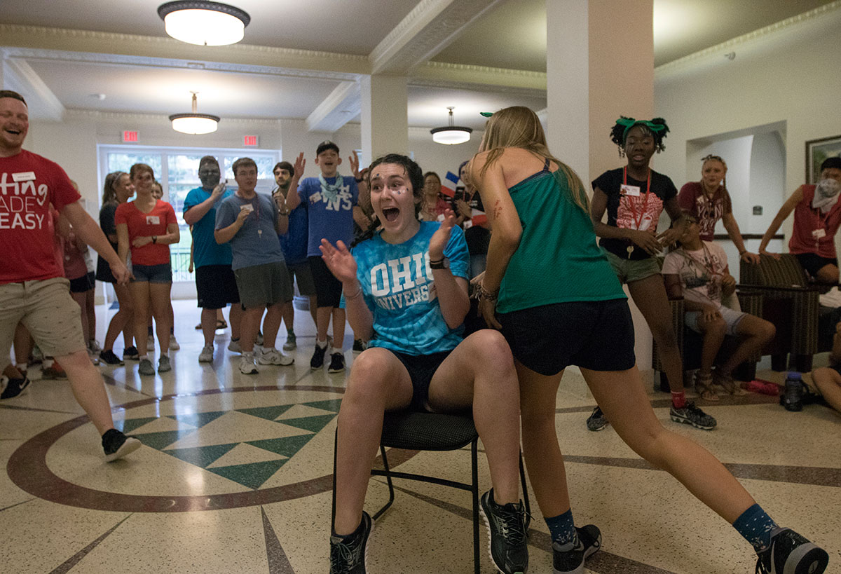 Maddie Hall of The Plains, Ohio, beats out Lauren Simons of London, Ky., for a final round of musical chairs during VAMPY Olympics Saturday, July 1. (Photo by Brook Joyner)